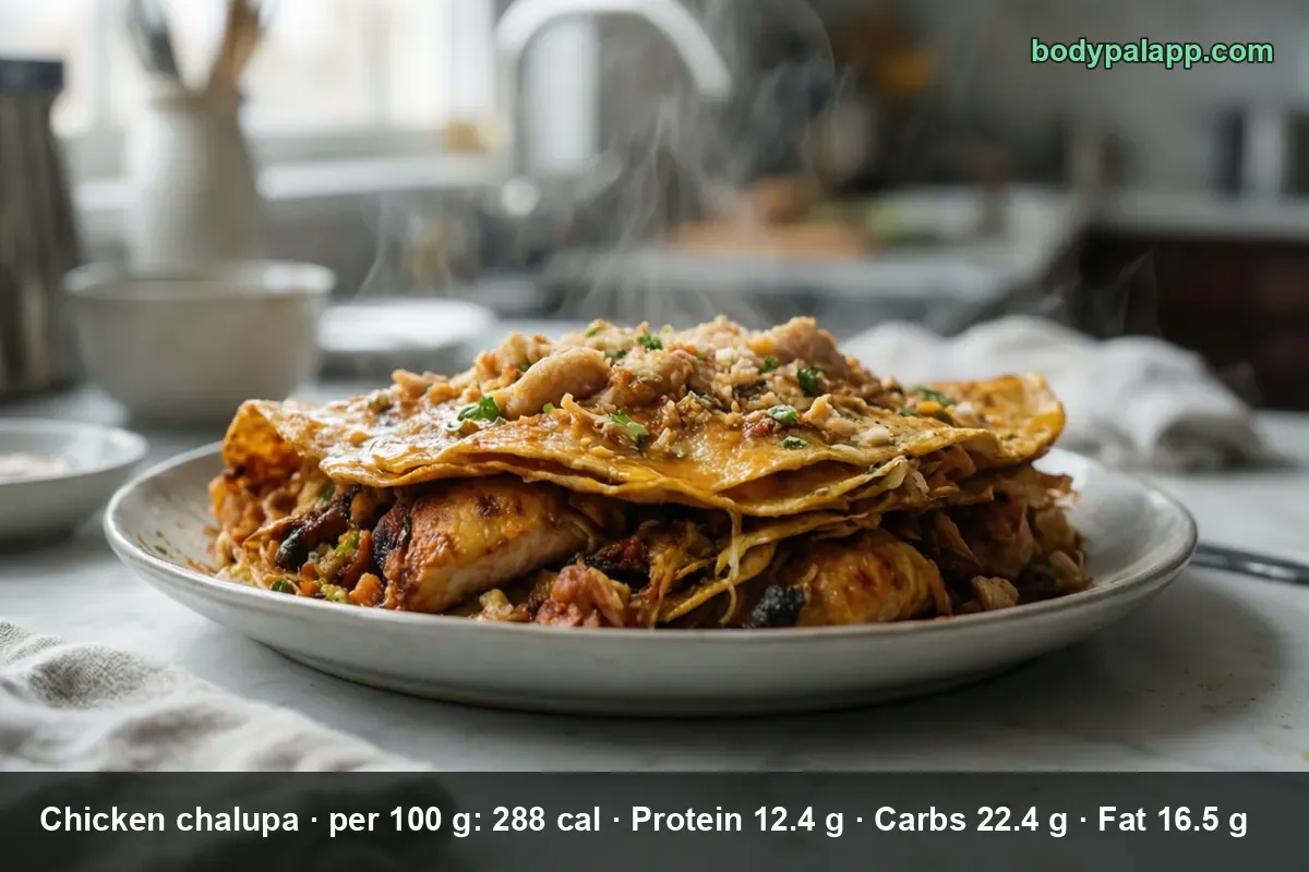 Stack of crispy layered tortillas topped with shredded chicken, melted cheese and green onion