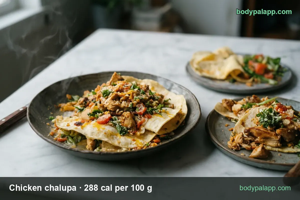 Three plates of chicken chalupas with tomato, greens and cheese; chips show 1 chalupa (170 g) 490 cal and 1/2 chalupa (85 g) 245 cal